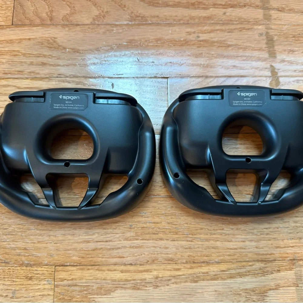 Black Spigen Steering Wheels Designed for Nintendo Switch 2 JoyCon Controllers